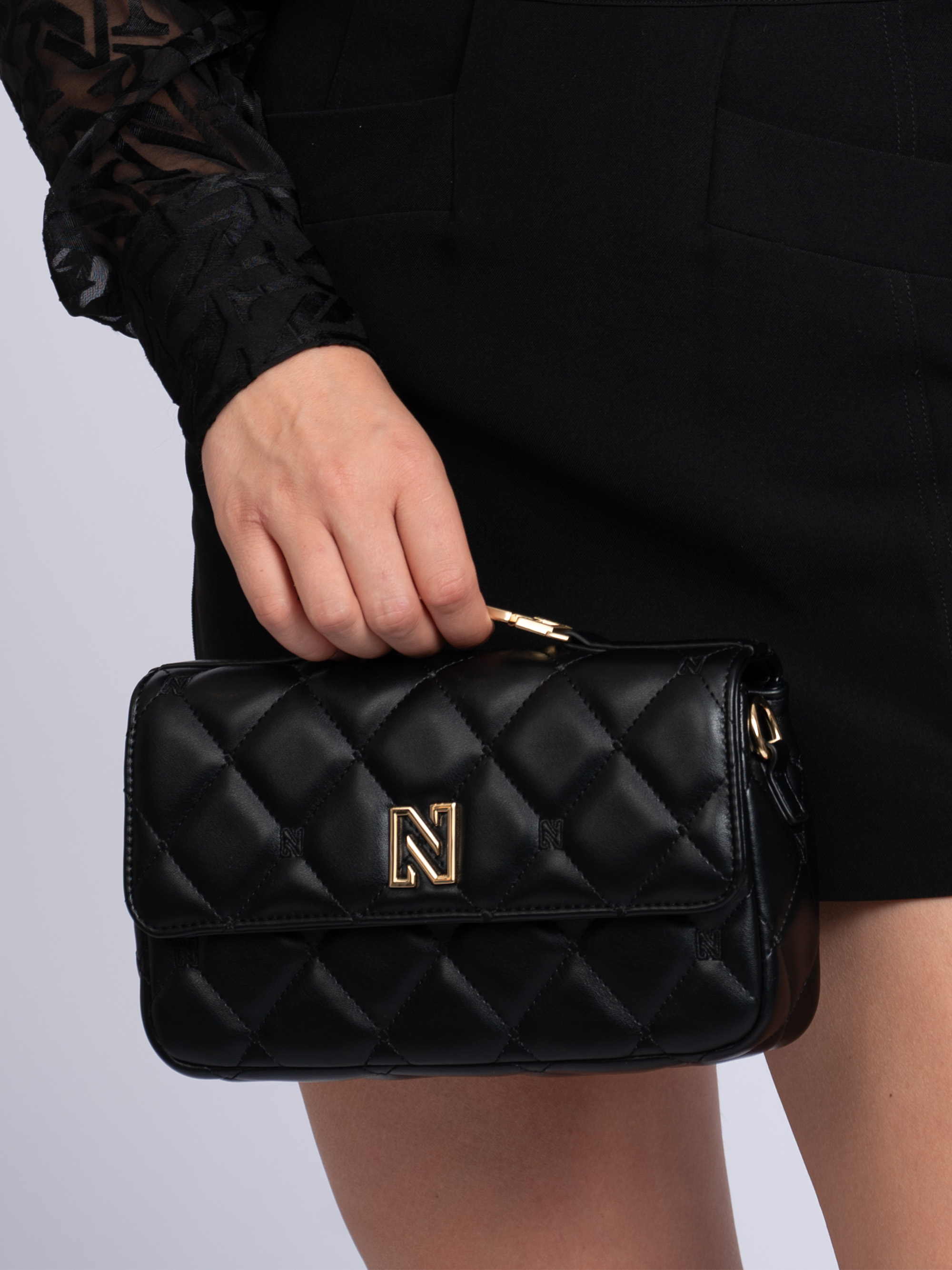 Gewatteerde clutch met hengsel en N-logo