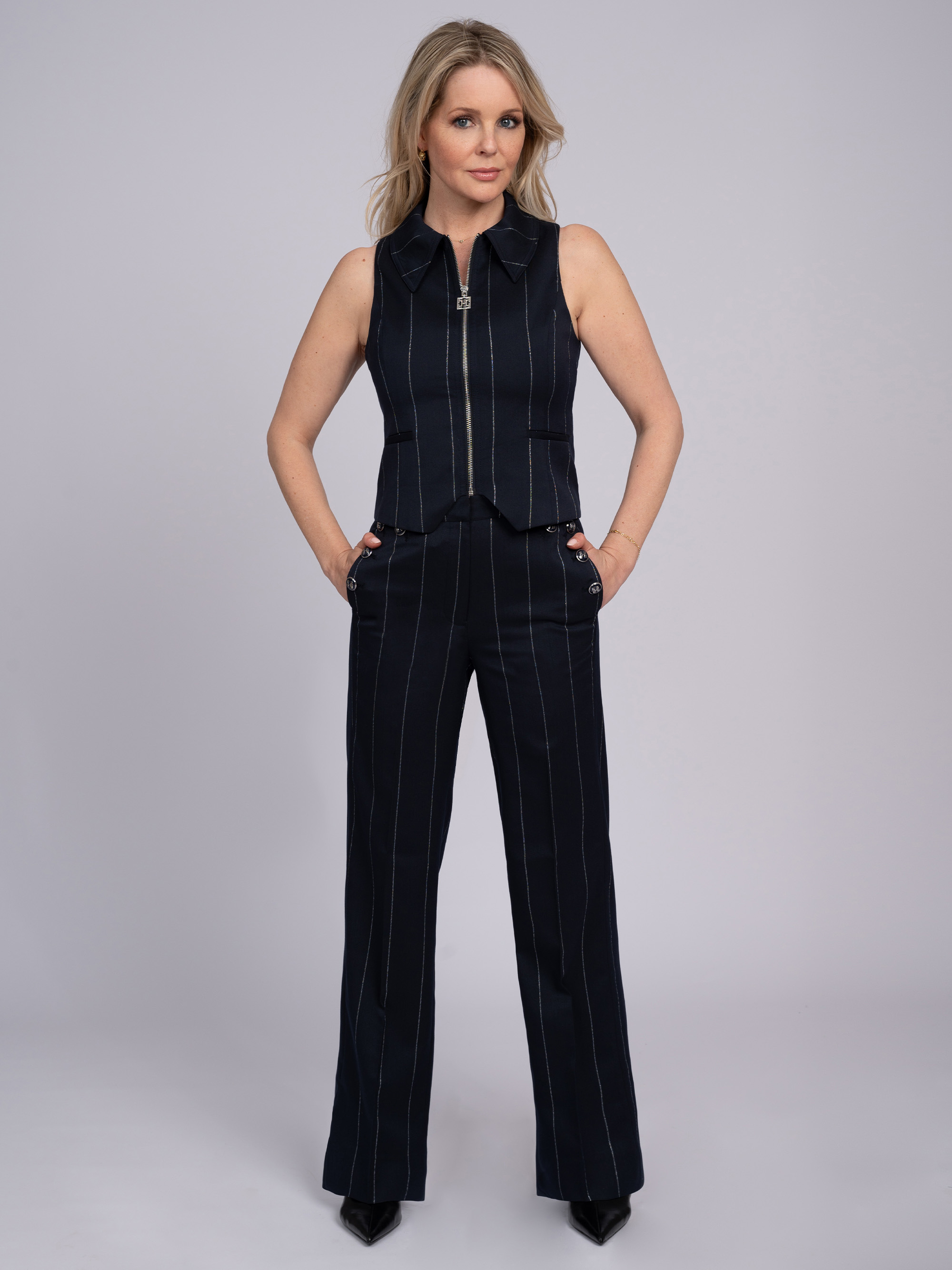 Striped trousers with decorative FH buttons