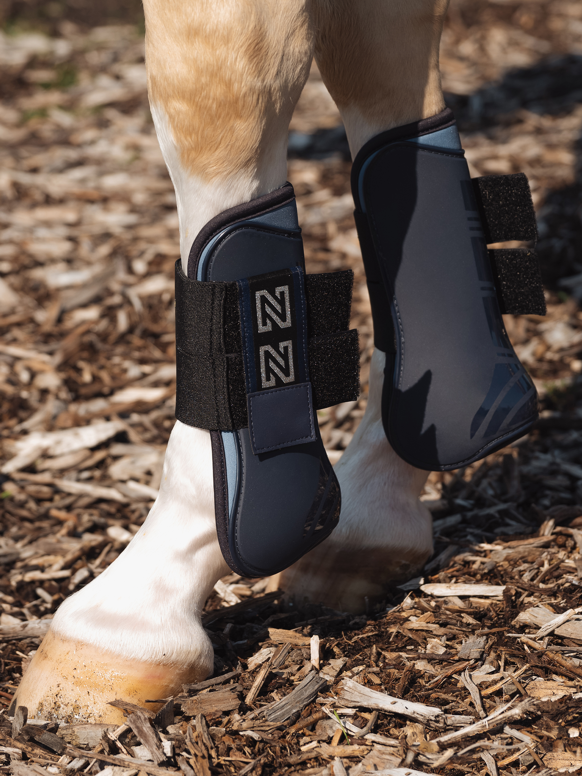  Tendon Boots with N logo