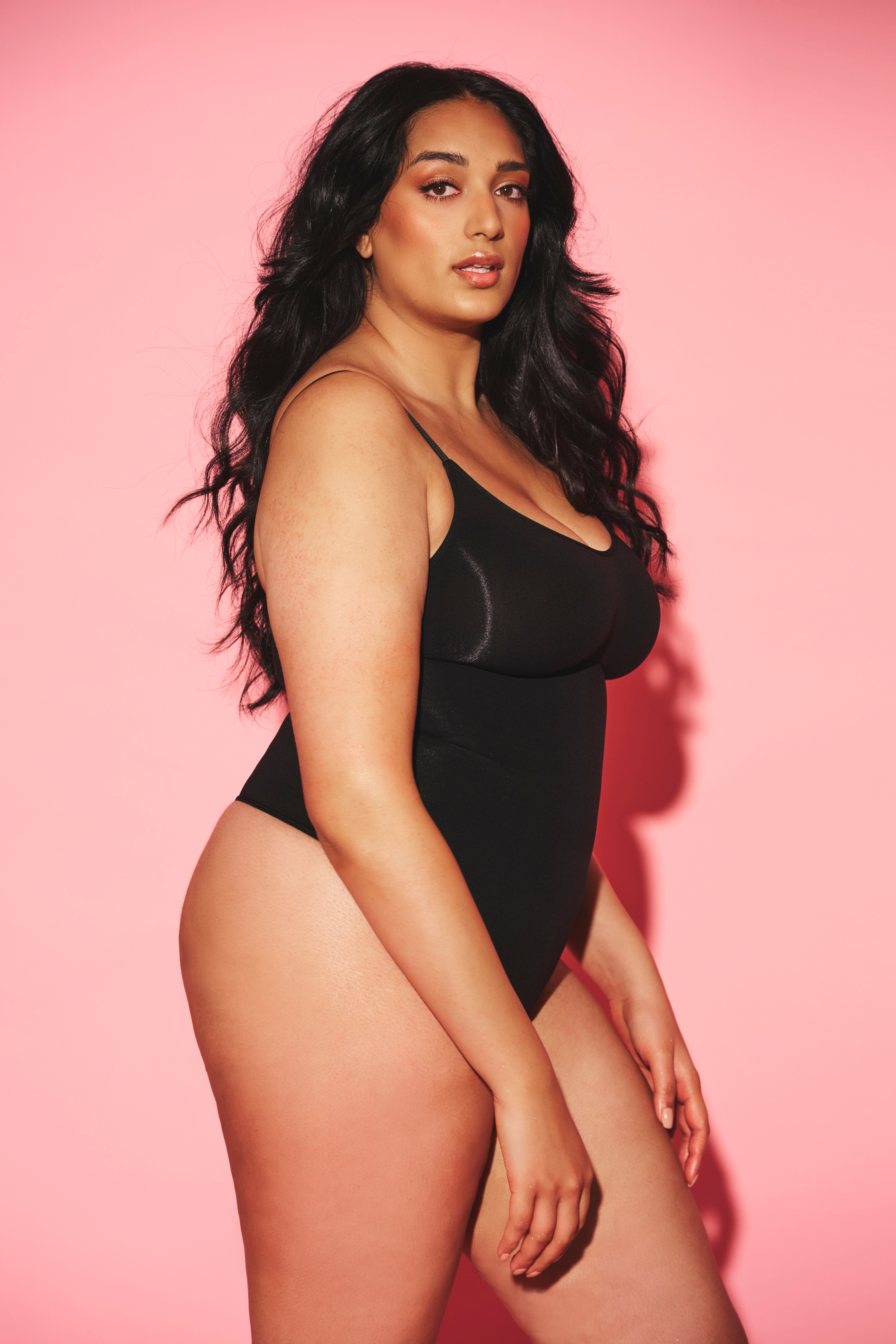 Thong body with adjustable shoulder straps