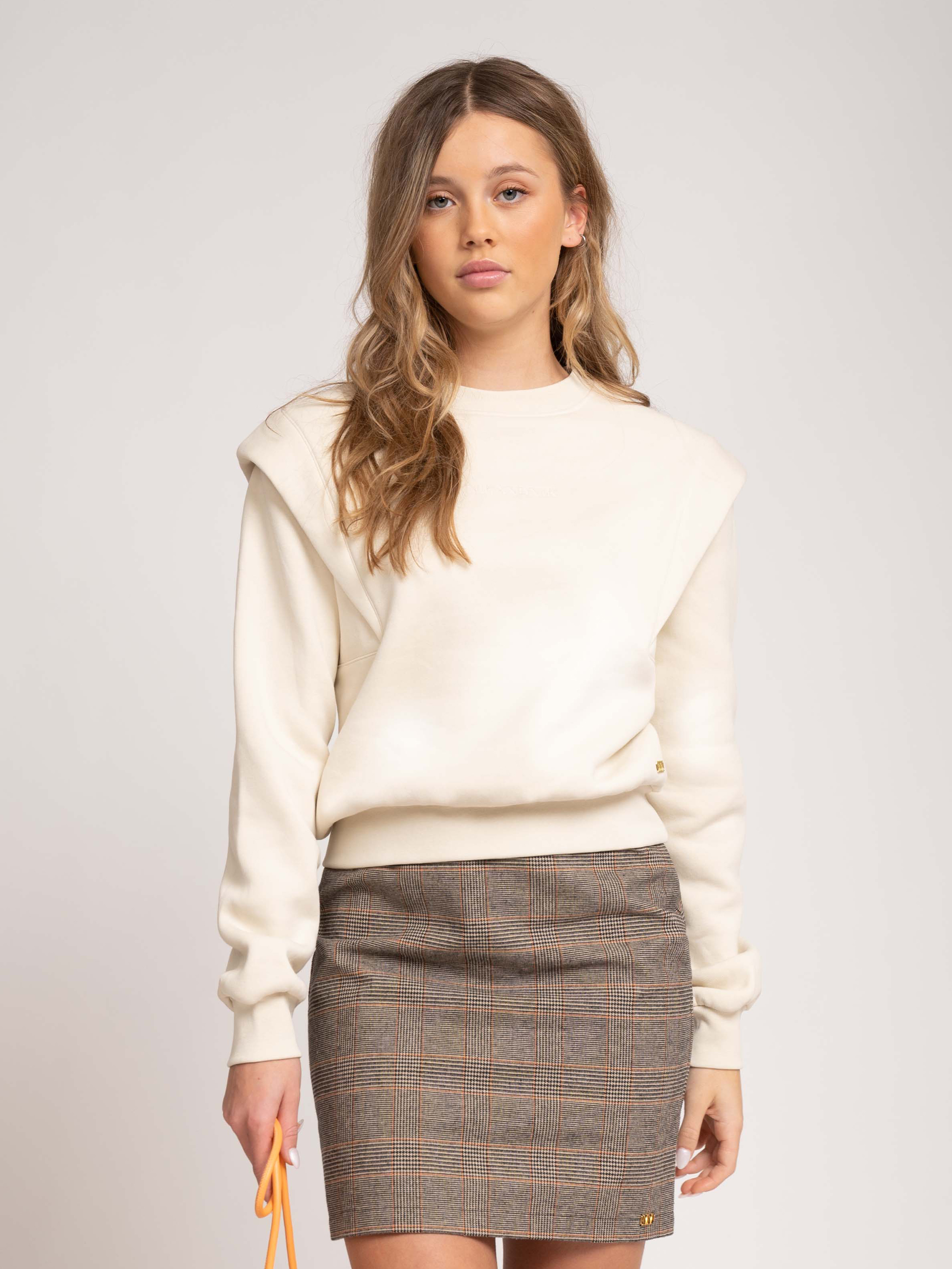 Sweater with padded shoulders