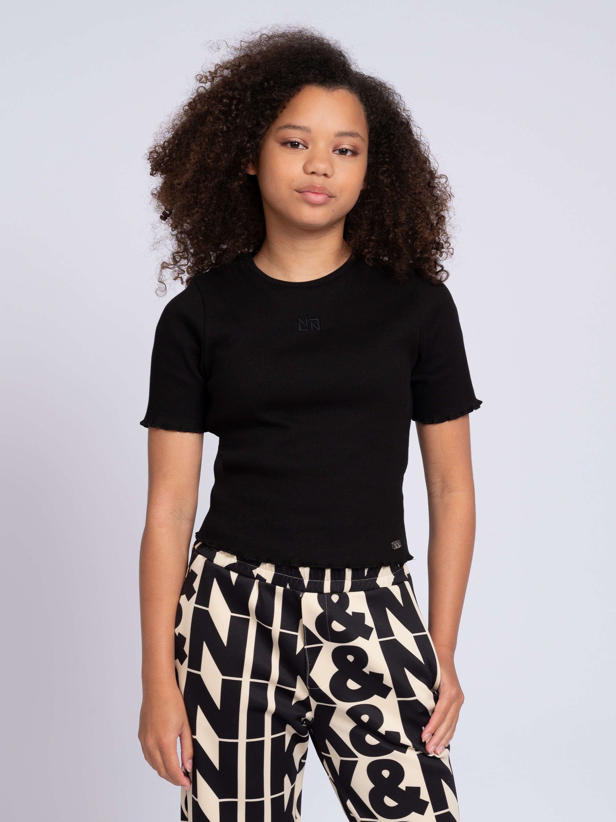 Ribbed top with ruffles