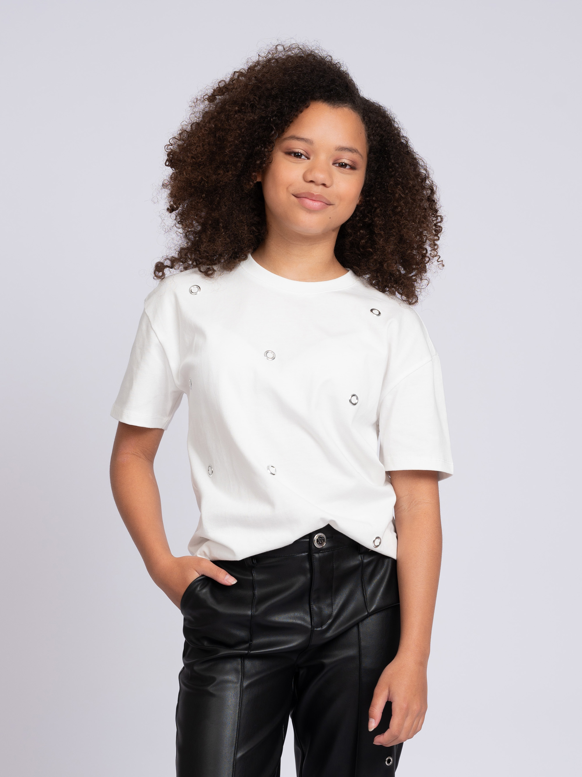 T-shirt met decoratieve ringetjes