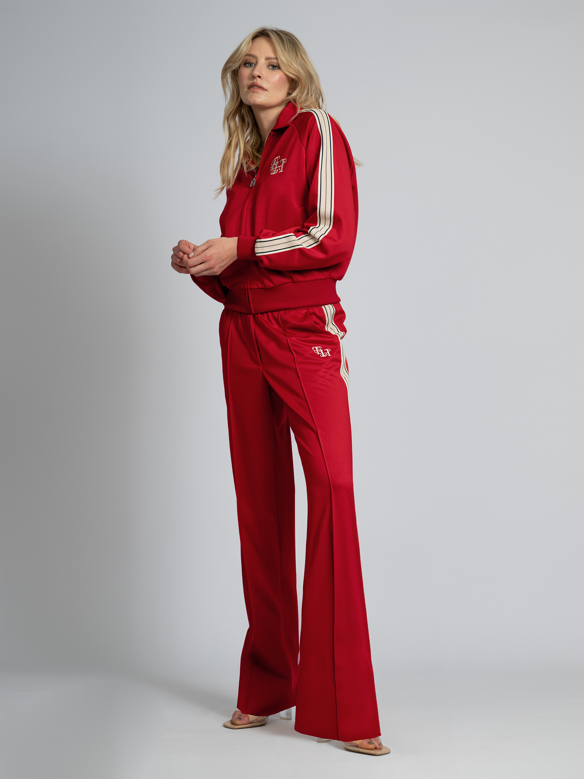 Pants with FH logo and piping along the sides