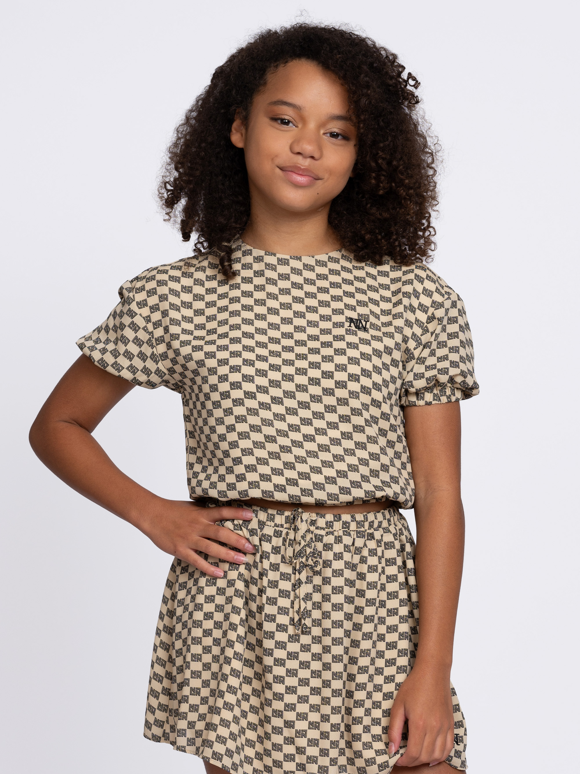 Top with logo pattern and puff sleeves