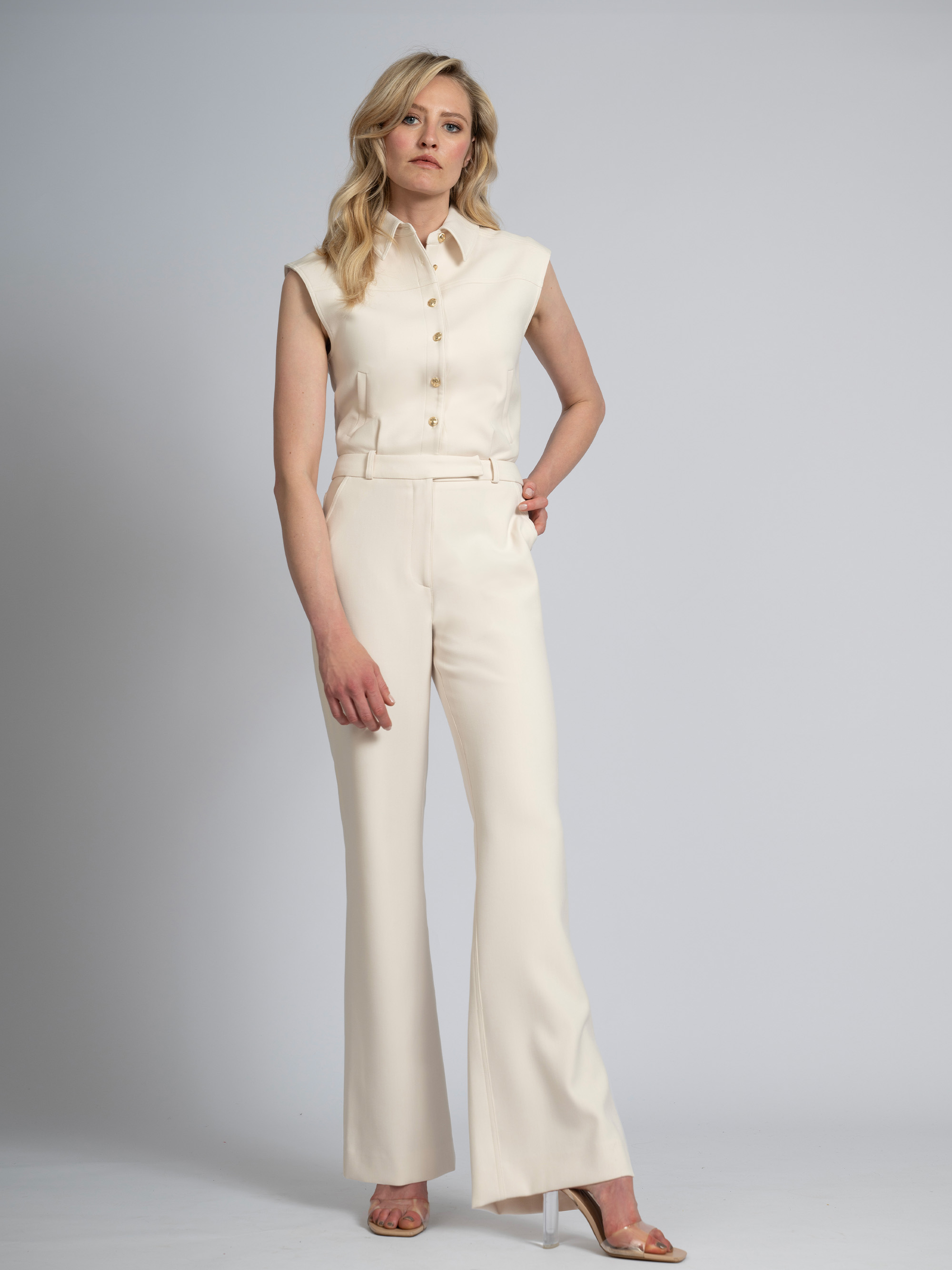 Fitted jumpsuit with row of FH buttons and wide legs