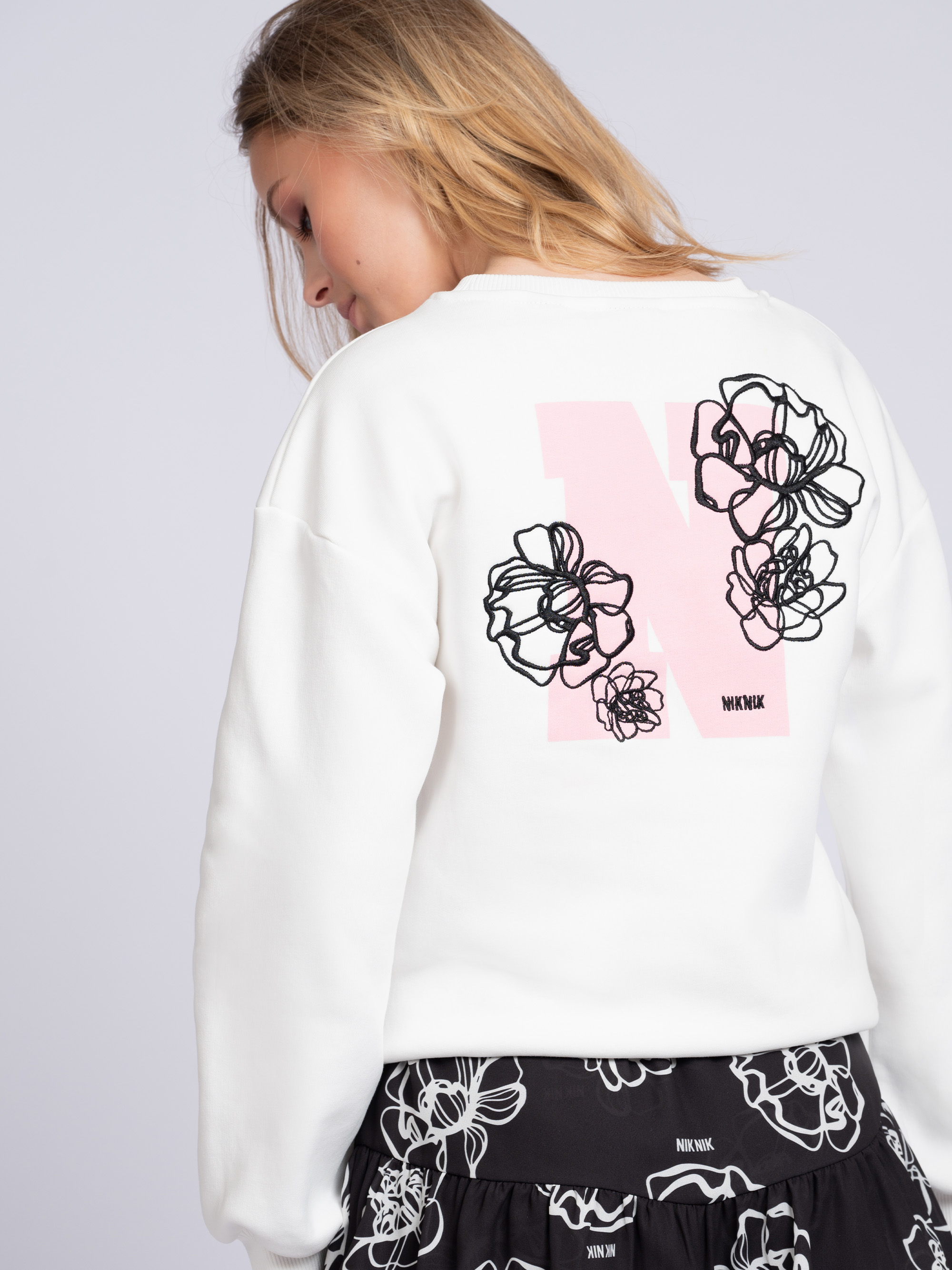 Sweater with graphic logo and floral print