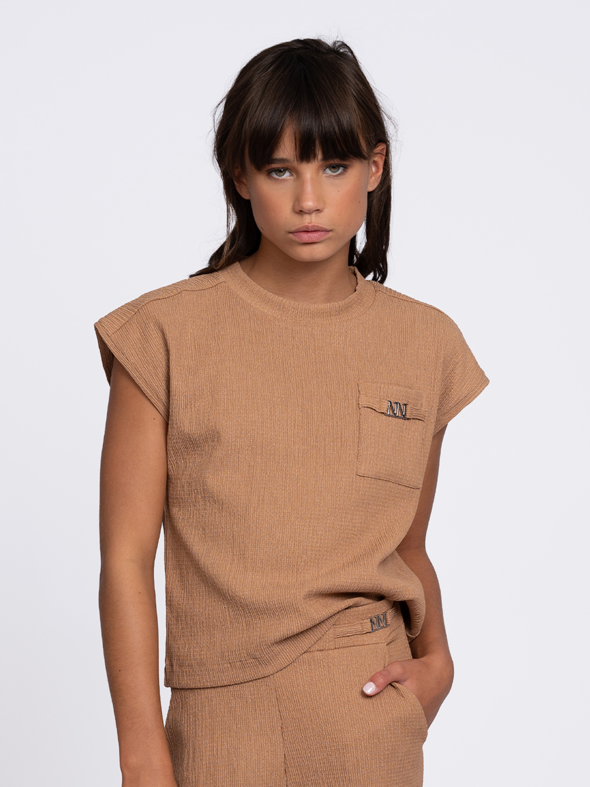 Lightweight top with cap sleeves