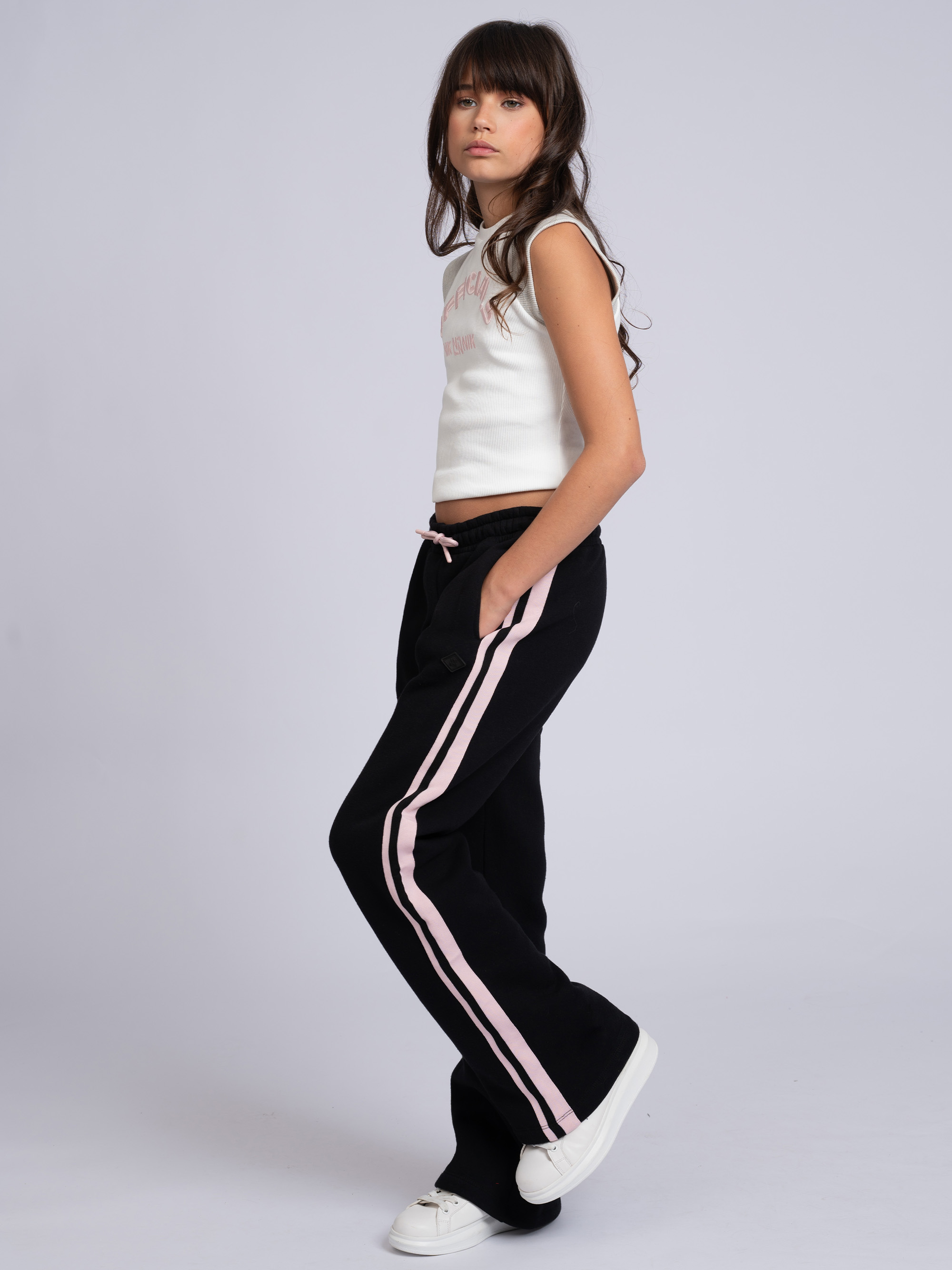 Flared sweatpants with stripes on the sides
