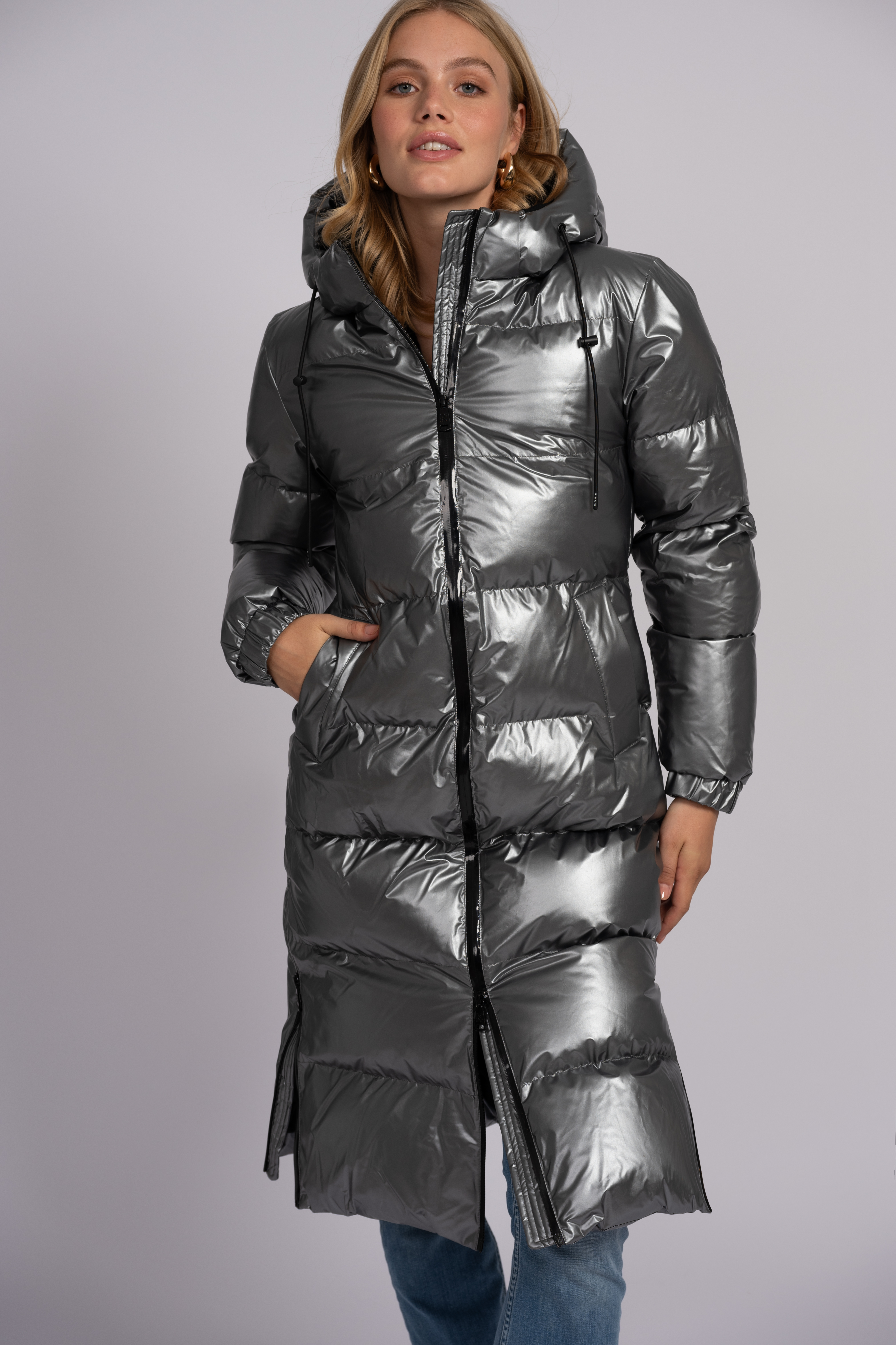 Long puffer jacket with metallic look