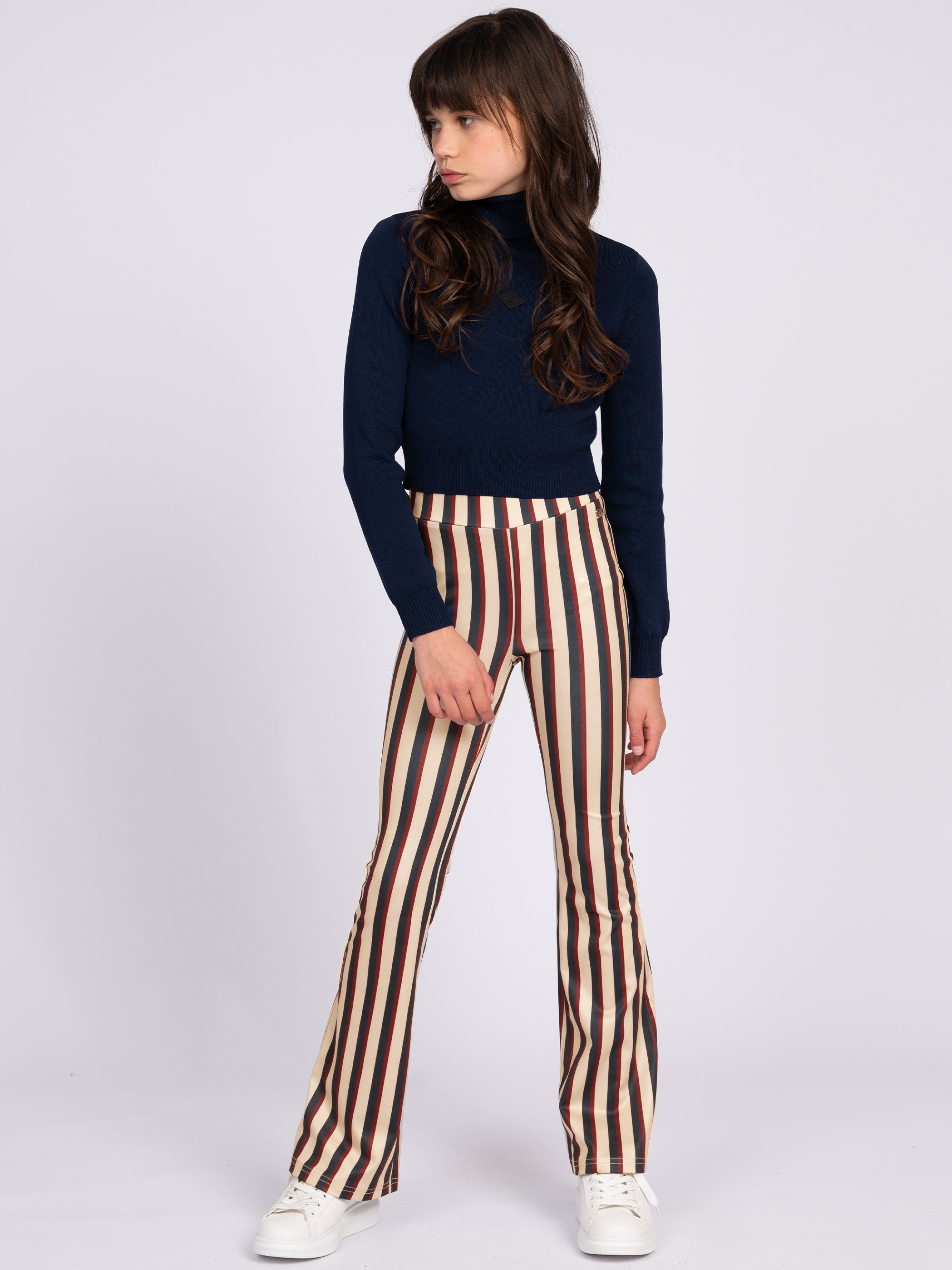 Flared pants with striped pattern