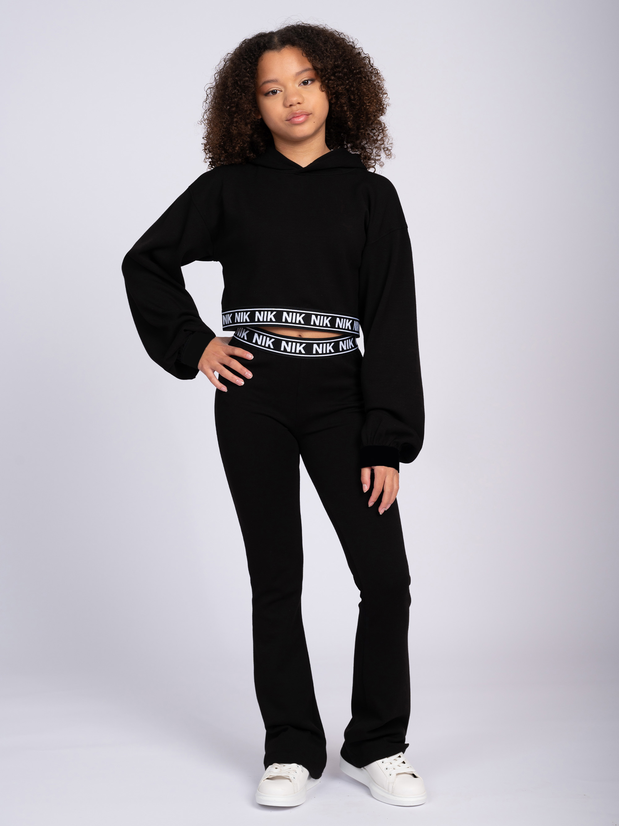 Flared pants with NIK&NIK waistband