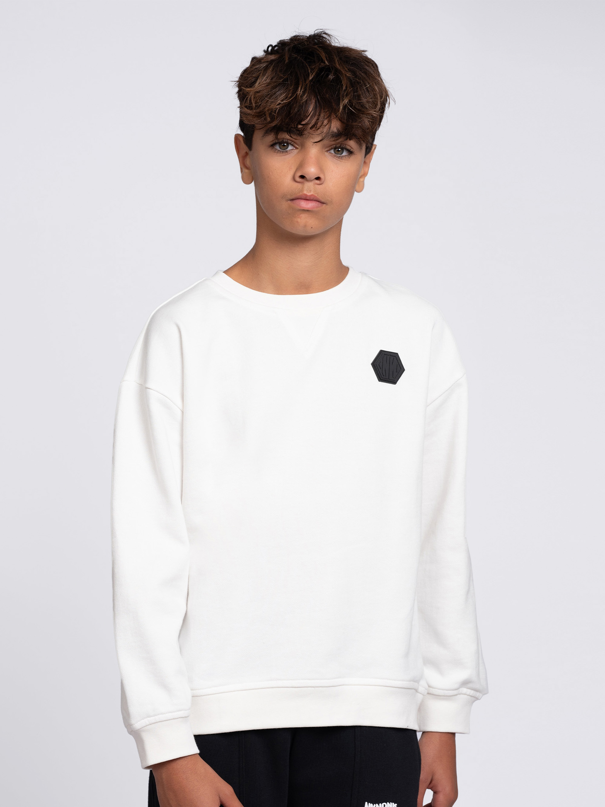 Oversized sweater with logo patch