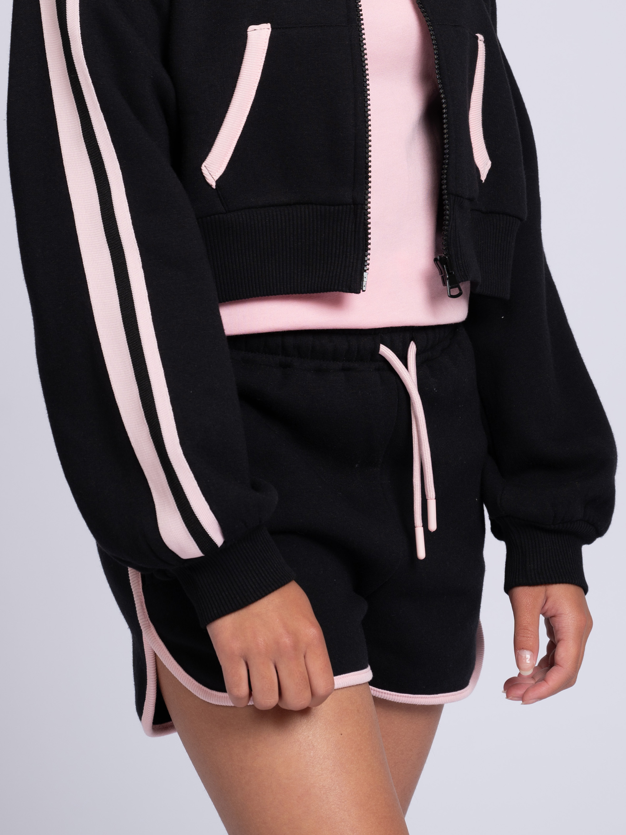 Sweatshorts with elastic waistband and pink accents 