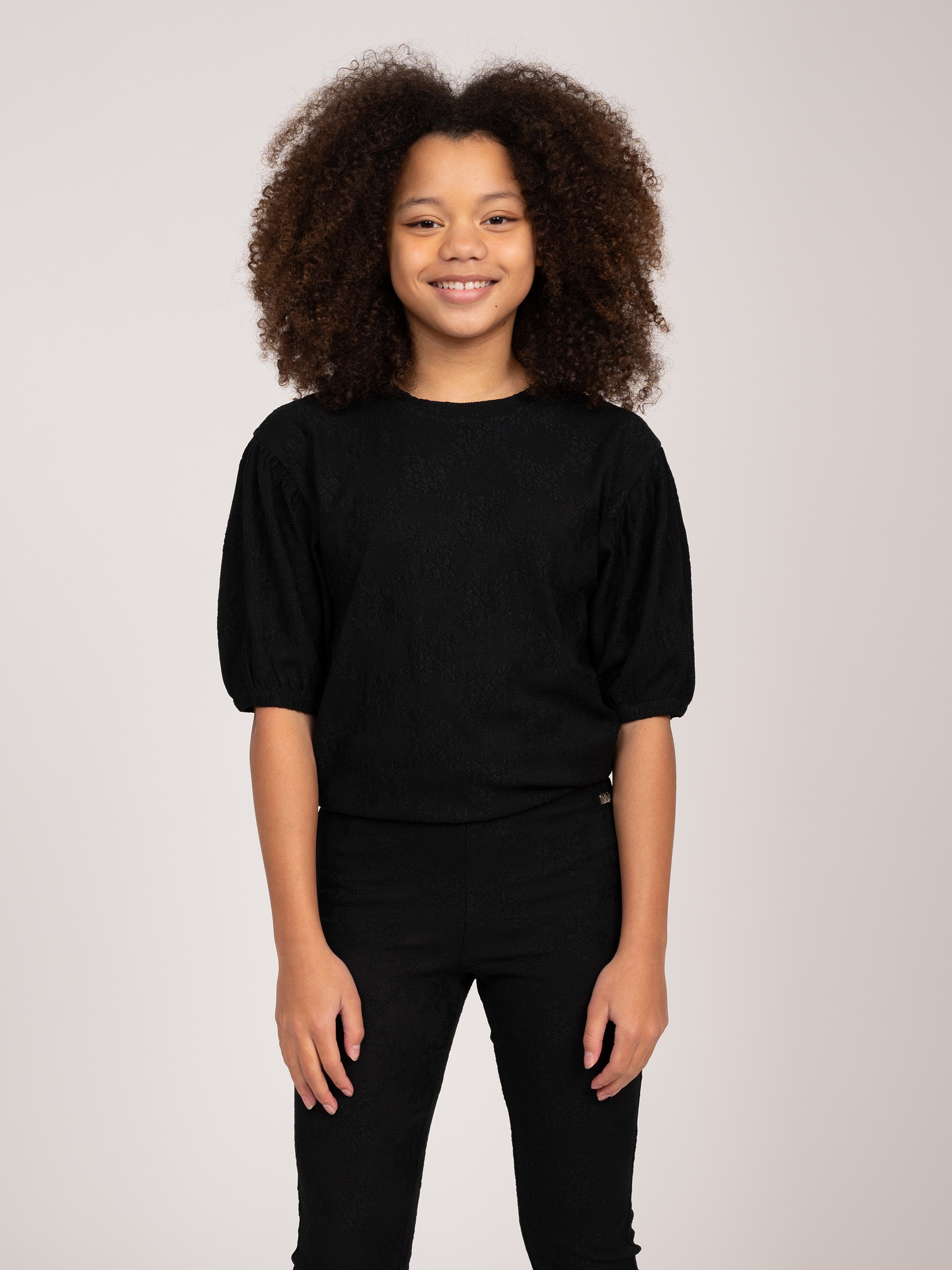 Top with woven-in floral print